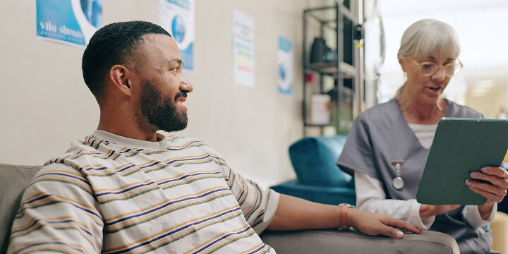 nurse talking to patient